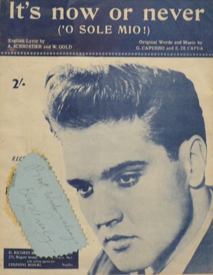 Lot 84U - Elvis Presley, a framed autograph sheet bearing signature