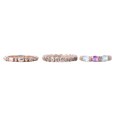 Lot 471 - A gemset dress ring, and two silver Pandora rings.