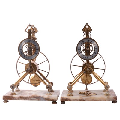 Lot 173 - Two matching Skeleton clocks