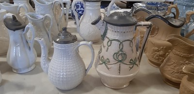 Lot 44 - Six Staffordshire stoneware jugs and pots