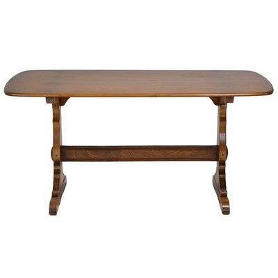 Lot 319 - Ercol eight-piece dining suite