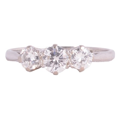 Lot 73 - A diamond three stone ring.