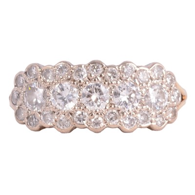 Lot 87 - A diamond half hoop ring.