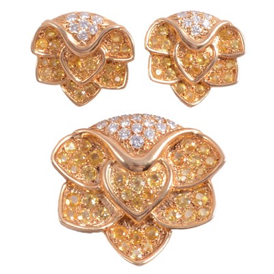 Lot 217 - Rene Boivin - a signed suite of 18 carat yellow gold natural yellow sapphire and diamond jewellery.