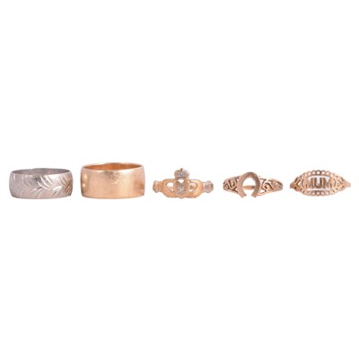 Lot 142 - An 18 carat white gold wedding band and four 9 carat yellow gold rings.