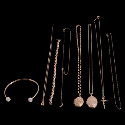 Lot 163 - A 9 carat yellow gold torque bangle, pendant and chains.