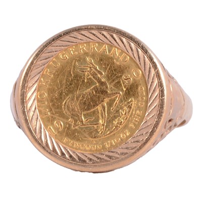 Lot 176 - Two gold coin rings.