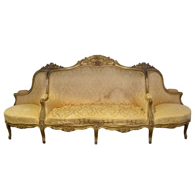 Lot 516 - French carved wood and gilt confidante sofa