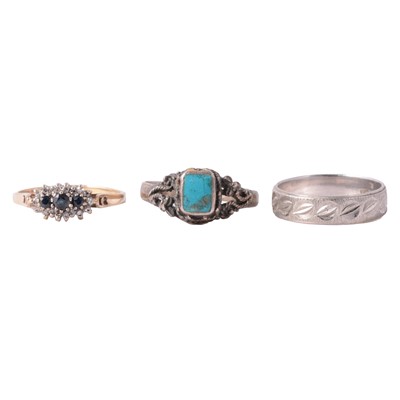 Lot 164 - A white metal wedding band marked Plat, and two gemset rings.