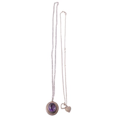 Lot 353 - Three gemset pendants, and two chains.