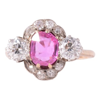 Lot 32 - CATALOGUE AMENDMENT- A pink corundum and diamond cluster ring.