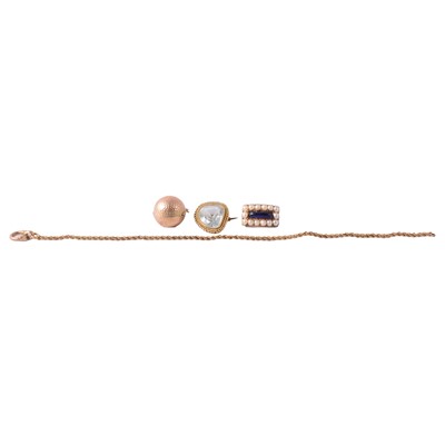 Lot 310 - Two gemset brooches, sphere charm, and short length of yellow metal chain.