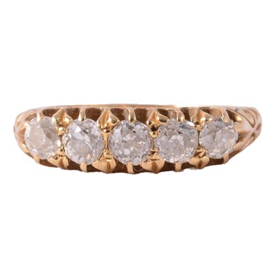 Lot 80 - A diamond five stone ring.