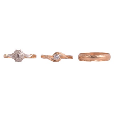 Lot 233 - A diamond solitaire ring, cluster and wedding ring.