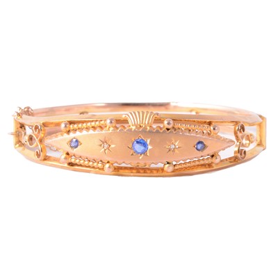 Lot 277 - A Victorian sapphire and diamond half hinged bangle.