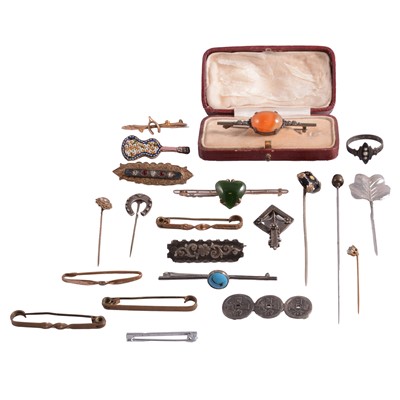 Lot 328 - A collection of brooches and pins and a mourning bring.