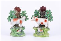 Lot 27 - Near pair of Staffordshire pearl glazed...