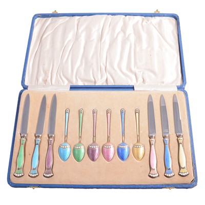 Lot 200 - Silver gilt and harlequin enamelled set of knives and spoons