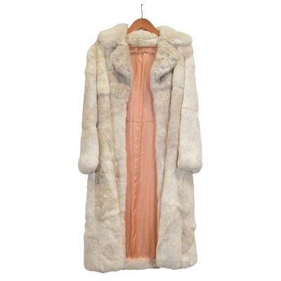 Lot 502 - A long white rabbit fur coat, and an astrakhan fur jacket.
