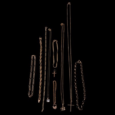 Lot 298 - A collection of gold and yellow metal chain bracelets, necklaces, and pendants.