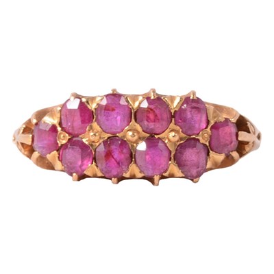 Lot 37 - A ruby half hoop ring.
