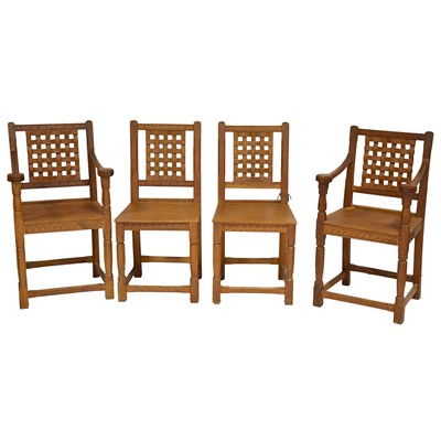 Lot 358 - Yorkshire craftsman made oak dining table and chairs, in the style of Mouseman