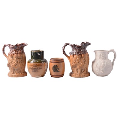 Lot 47 - Doulton Lambeth stoneware tobacco jar, whisky jug, Cobridge jug, etc