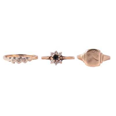 Lot 134 - A 9 carat gold signet ring, and two gemset gold rings.