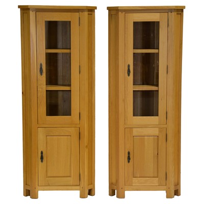 Lot 437 - Pair of contemporary light oak freestanding corner cabinets