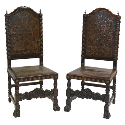 Lot 504 - Pair of stained wood back chairs, studded Spanish leather upholstery