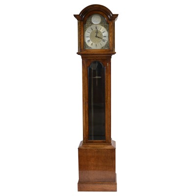 Lot 483 - Reproduction carved oak grandfather clock