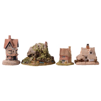 Lot 66 - Thirty-three Lilliput Lane cottages, champagne glasses, fridge magnets, and pocket guides.