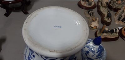 Lot 19 - Ten modern Chinese blue and white jars and covers
