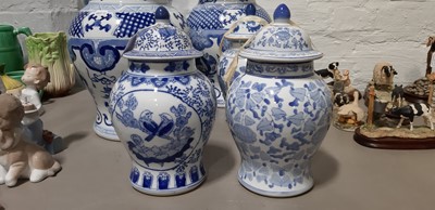 Lot 19 - Ten modern Chinese blue and white jars and covers