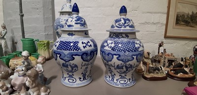 Lot 19 - Ten modern Chinese blue and white jars and covers