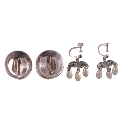 Lot 1229 - Two pairs of Scandinavian white metal earrings.