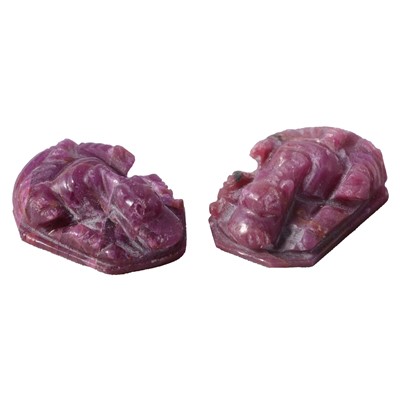Lot 327 - A pair of small carved corundum Ganesh figures.