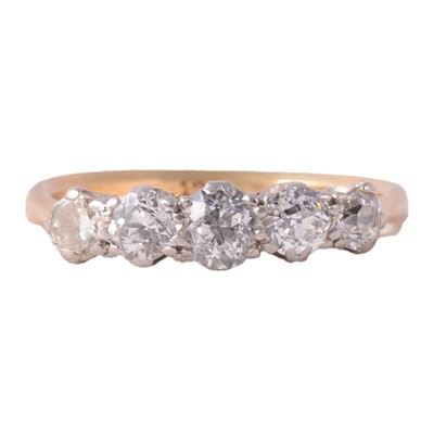 Lot 83 - A diamond five stone ring.