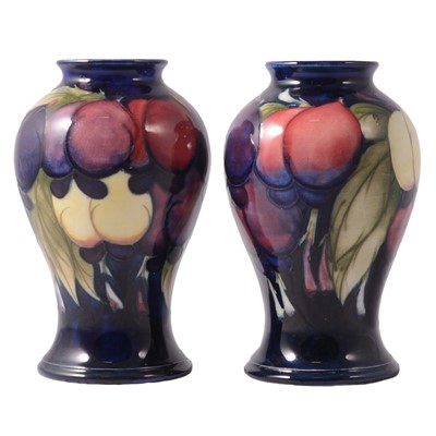Lot 58 - Moorcroft Pottery, a pair of 'Wisteria' pattern vases, circa 1920s