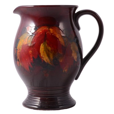 Lot 81 - Moorcorft Pottery, a 'Flambe Leaf and Berry' pattern jug, circa 1930