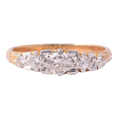 Lot 82 - A diamond five stone ring.