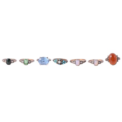 Lot 132 - Four solitaire rings marked 9ct and silver, and three other vintage rings.