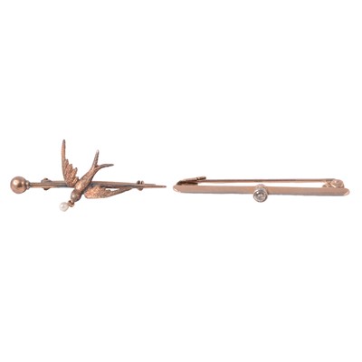 Lot 224 - A diamond set bar brooch, and a swallow brooch.