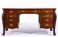 Lot 383 - Edwardian mahogany library desk, canted...