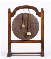 Lot 384 - Oak framed floor-standing gong, the frame with...