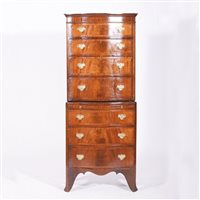 Lot 387 - George III style mahogany serpentine chest on...