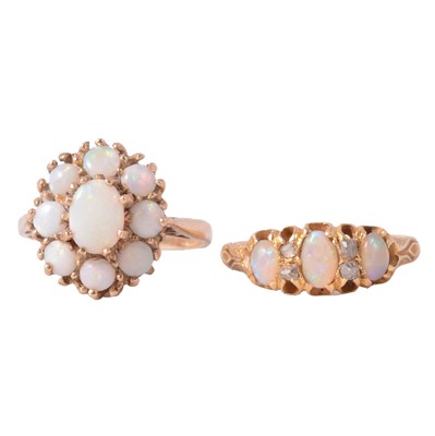 Lot 52 - An opal and diamond ring, and an opal cluster ring.