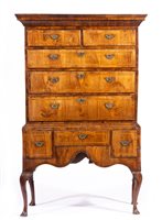 Lot 390 - George II walnut chest on stand, moulded...