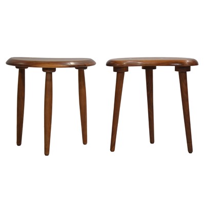 Lot 549 - Two modern kidney-shaped stools, in the manner of Ercol