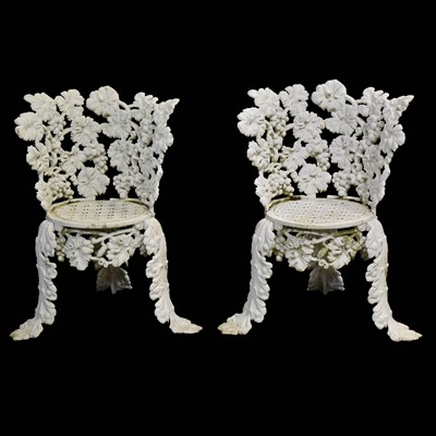 Lot 570 - Pair of cast metal garden chairs